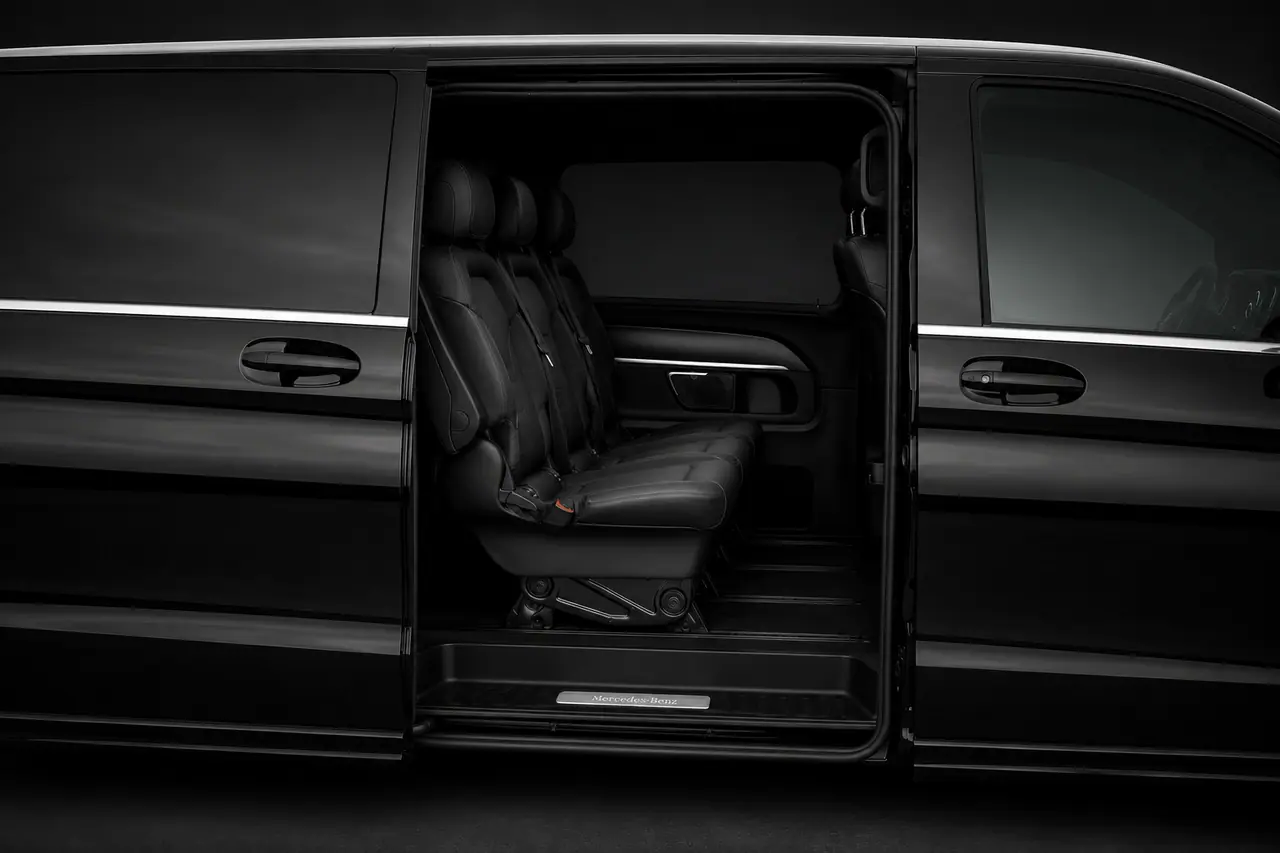 Leather seating inside the Mercedes-Benz V-Class, seen through the open sliding door